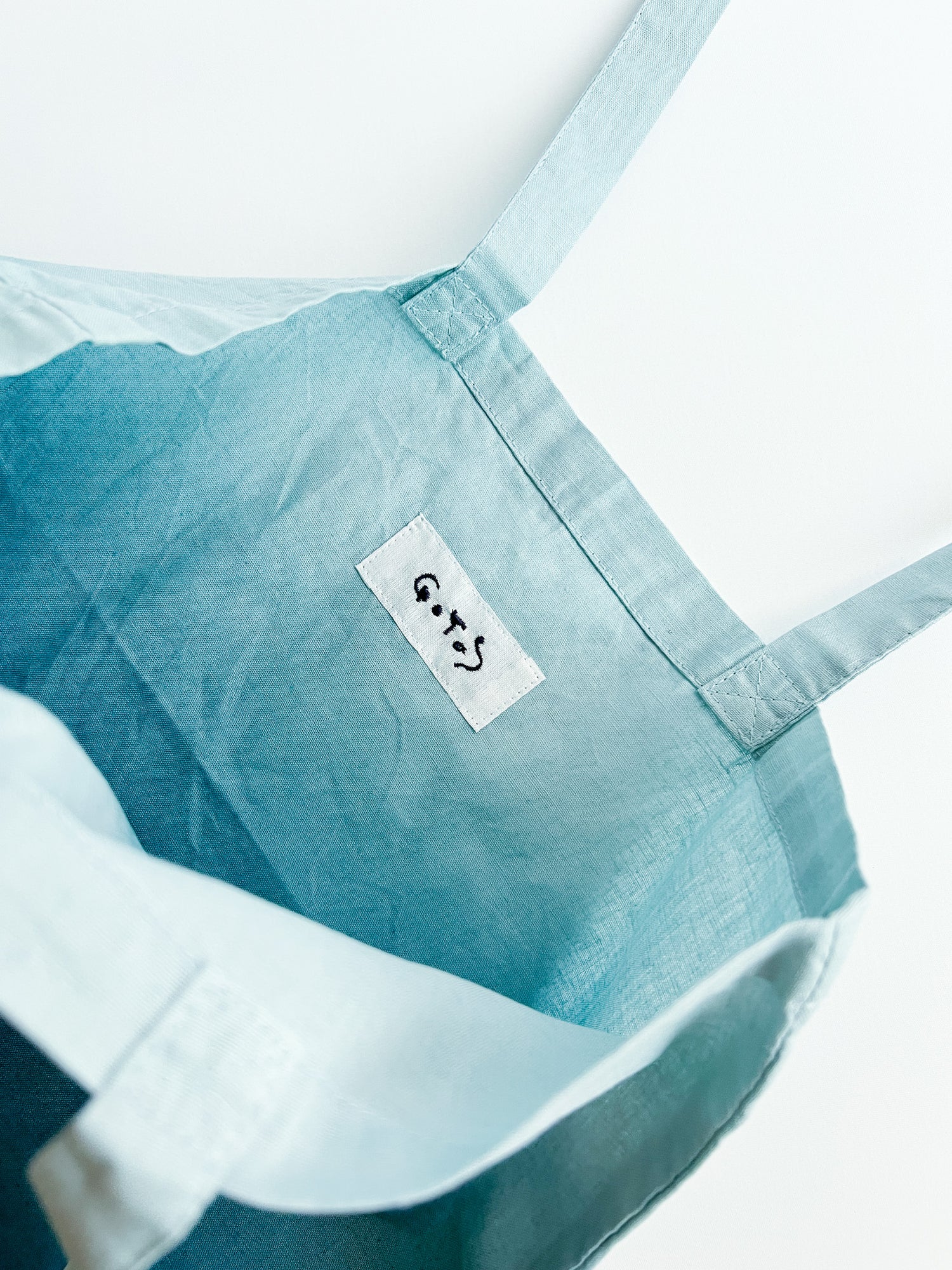 Gotas Water surface tote bag　錆納戸